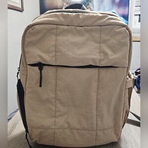 Cluci cream quilted travel backpack nwot